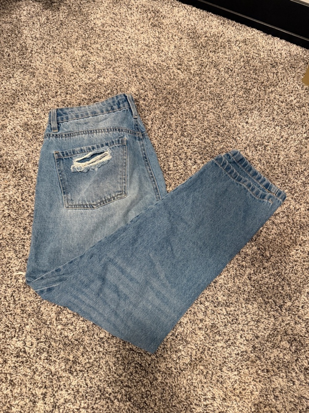 Womans Blue Distressed Denim Jeans